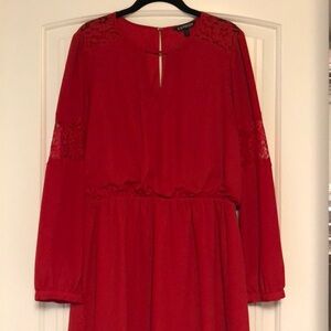 Red long sleeve cinched waist v neck dress